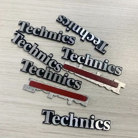Емблема на акустичну сітку гриль Technics 301076 фото