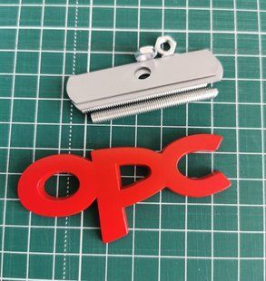 3D емблема OPC LINE на решітку радіатора червона 301055 фото